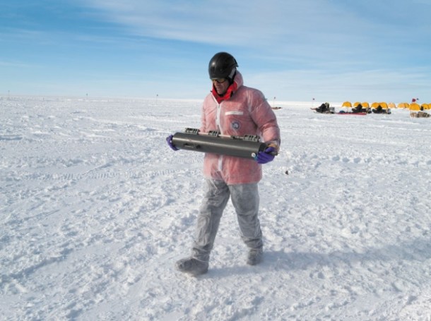 A researcher carries a recently extracted sample of Lake Whillans water. Photo credit: J.T Thomas, from http://www.nature.com/news/lakes-under-the-ice-antarctica-s-secret-garden-1.15729