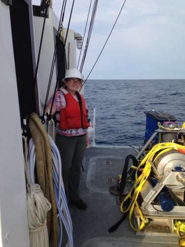 Megan at sea, modeling the finest in construction site chic. She was participating in a cruise to retrieve and redeploy an oceanographic sampling instrument. Photo by Harvey Seim.